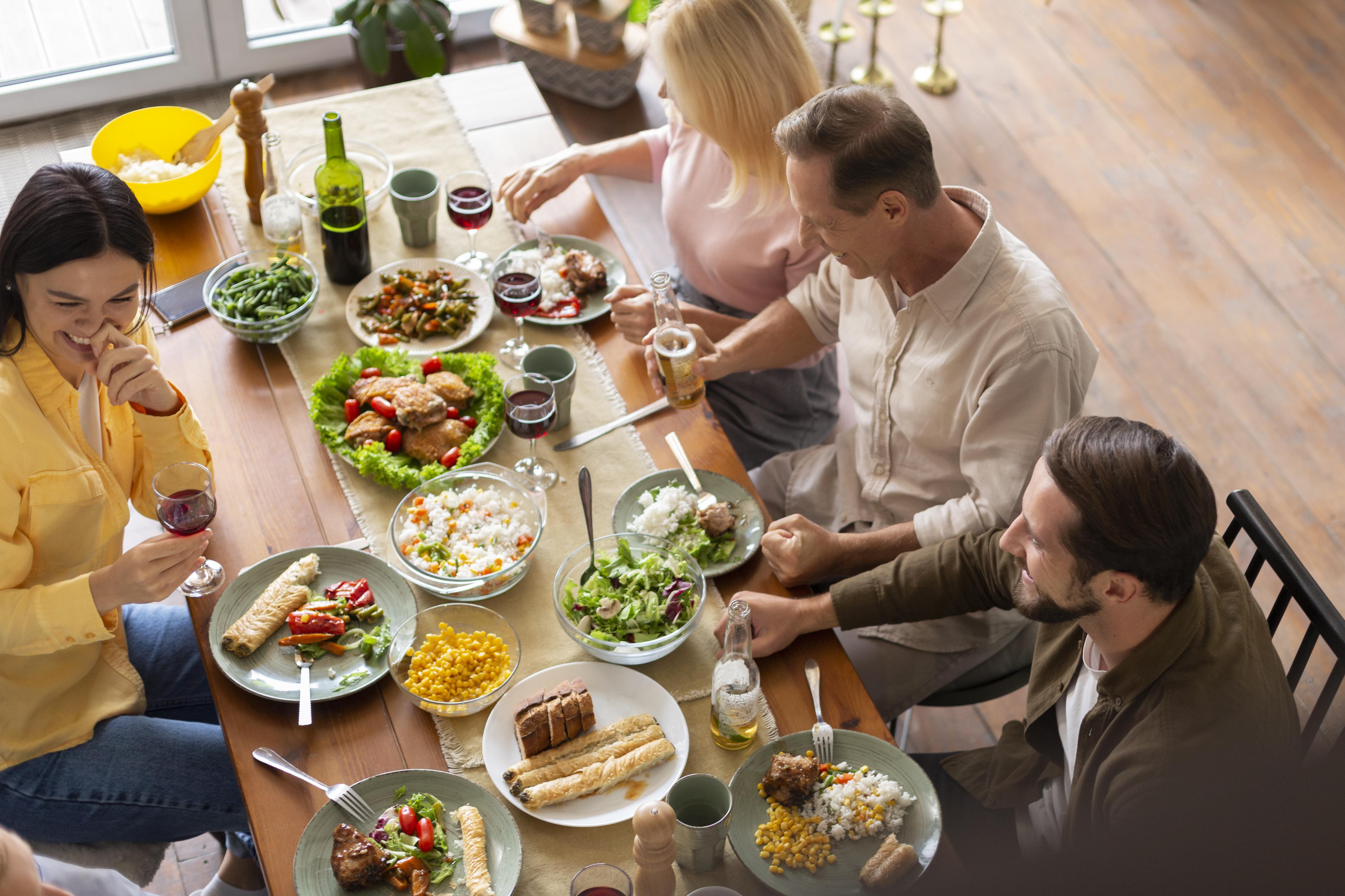 Family having lunch on a wood table